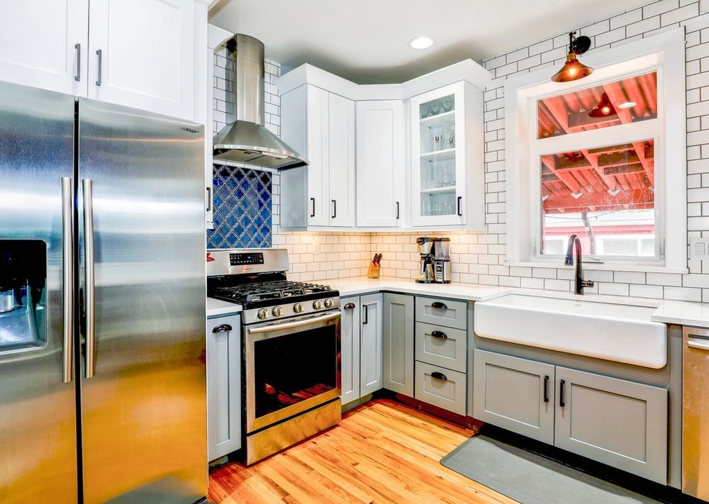 Kitchen with custom cabinetry and farmhouse sink